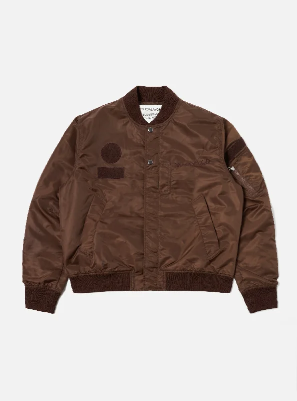 Universal Works Badge Bomber in Brown Flight Nylon Sophisticated Men's French