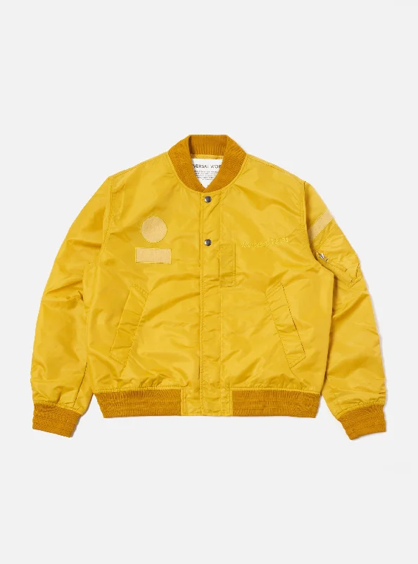 Universal Works Badge Bomber in Yellow Flight Nylon Polished Men's Silk