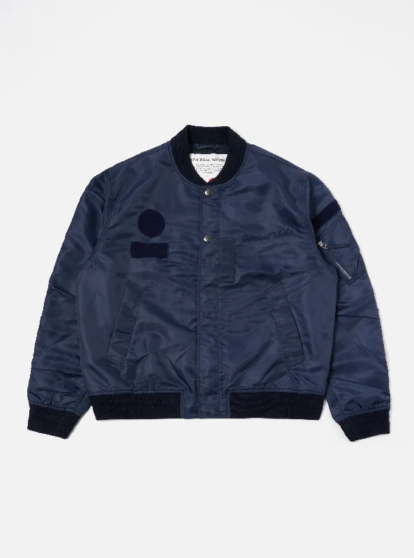 Universal Works Badge Bomber in Navy Flight Nylon Bold Men's Statement